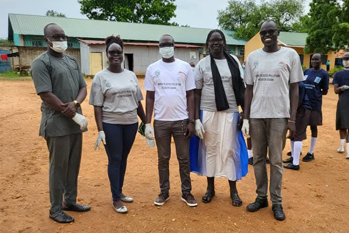 Members of the Episcopal Church of South Sudan lead a community clean-up, focused on reducing plastic pollution to protect and restore their land.